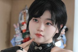 毛毛帽黑色靡烟旗袍写真解析：短发冷艳与东方氛围的高级平衡-绅士网